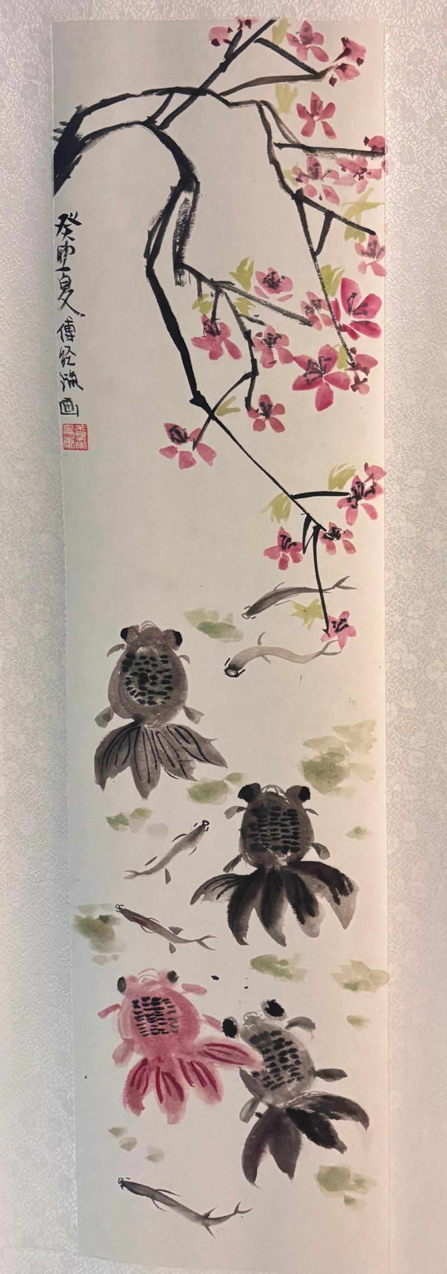 Ink and watercolor scroll of pink peach blossom branches above goldfish swimming through still water